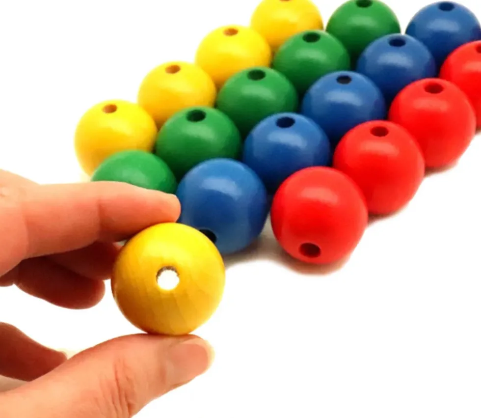 Boule percée 3 cm couleur jaune en bois - grosse perle hêtre diamètre 30 mm trou 6 mm