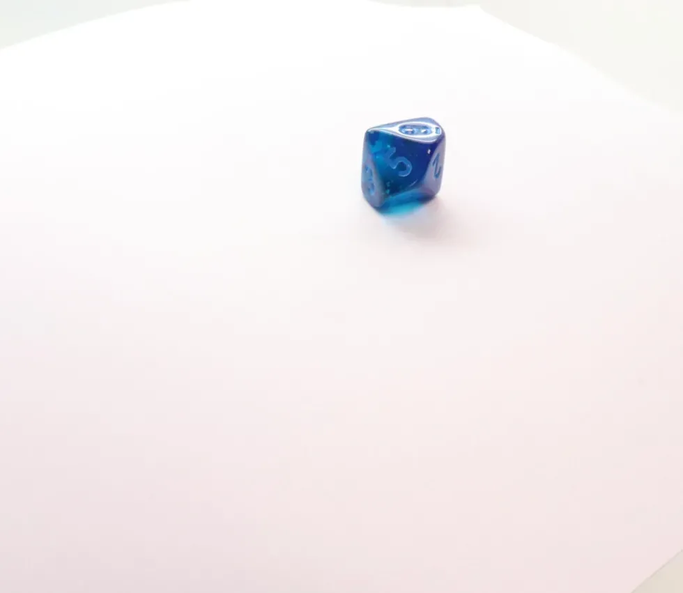 Dé 10 faces bleu Luminary chiffres bleus