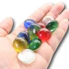 Galet coloré translucide 2 cm - bille plate pour jeu à l'unité