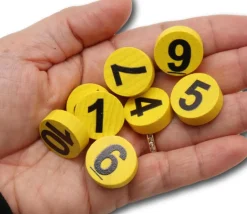 10 Jetons numérotés 1 à 10 bois 21x7mm coloris aléatoire