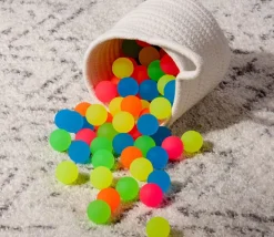 85 mini balles neon rebondissantes Ø 2.5 cm caoutchouc souple