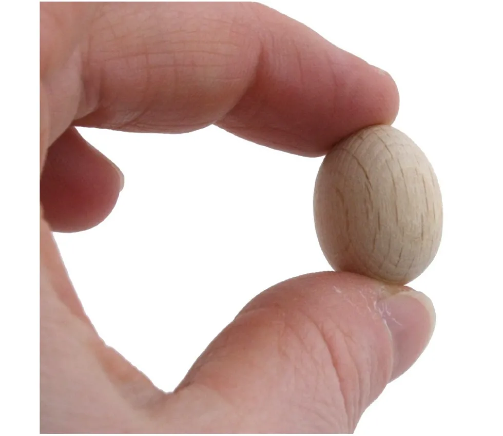 Mini Oeuf en bois naturel 2 cm de haut et 1.5 cm de diamètre