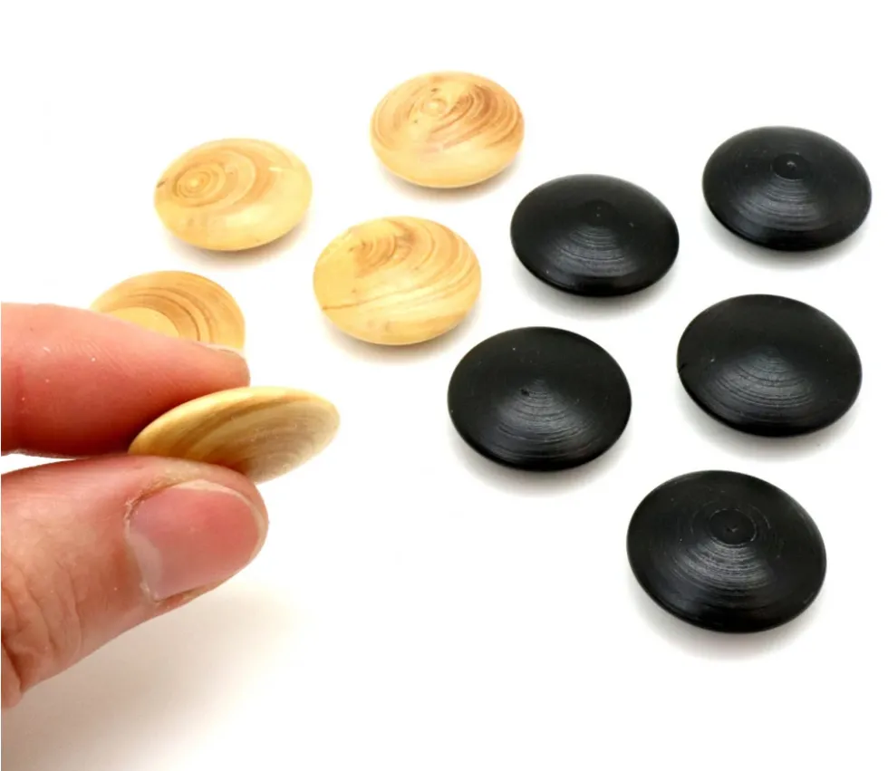 Palet galet 2.3 cm buis noir pour jeu de go unité