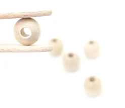 Perle bois naturel de 2 cm trou de 7 mm unité