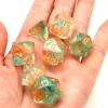 Set 7 dés multi-faces translucide et vert pailletés
